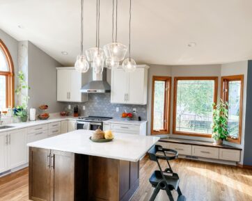 White quartz countertops and wooden accents