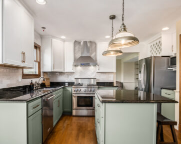 Modern kitchen with black granite countertops